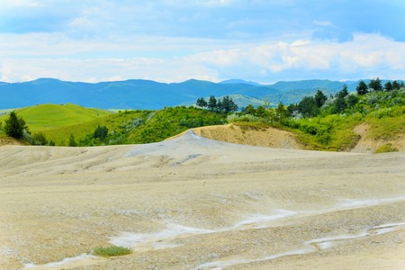 Mud volcano from Romania, refers to formations created by geo-exuded slurries usually including water and gases. There are several geological processes that may cause the formation of mud volcanoes.の写真素材