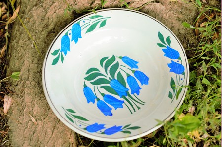 Unique and handmade clay painted plates, 50 years old, from creative peopleの写真素材
