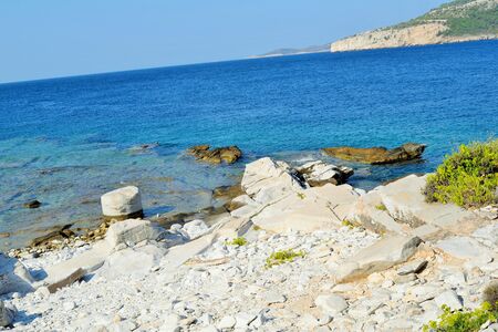 Aliki. From the archaic period until the Byzantine era, Aliki was one of the main Greek areas regarding the mining and exportation of marble. Nowadays, we can still trace the results of the ancient mining techniques through the sculptured rocks of the areの写真素材
