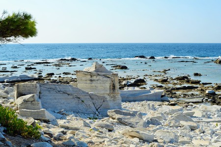 Aliki. From the archaic period until the Byzantine era, Aliki was one of the main Greek areas regarding the mining and exportation of marble. Nowadays, we can still trace the results of the ancient mining techniques through the sculptured rocks of the areの写真素材