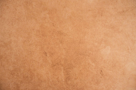 Textured light brown backgroundの写真素材