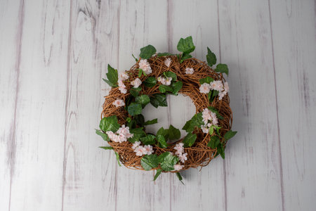 Newborn digital background with  leaves, flowers and a circle of dry woodの写真素材