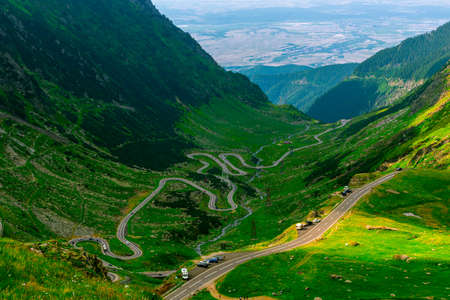 Panoramic view over the Transfagarasan road located in Romania, Sibiu county. Birds eye view over a road in the mountainsの写真素材