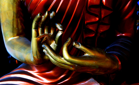 Hands of Buddha statue. Big Golden hand part of Buddha statue in Thailand.の写真素材