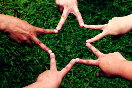 Human hand. People's hands together.の写真素材