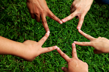 Human hand. People's hands together.の写真素材