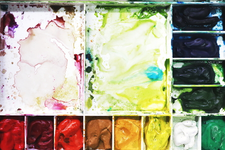 paint brushes on a colorful background.の写真素材