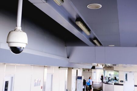 CCTV security camera operating in home. Image of CCTV security camera on background. cctv ball on safe ground.の写真素材