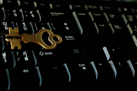 Silver key on black keyboard. Under key is enter button vocabulary. They are mean key for travel around the world is press enter button.の写真素材