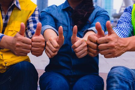 team work  together.They are join hands mean teamwork and spirit. Photo concept for harmonious and team work.の写真素材