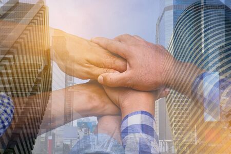 Double exposure picture.Picture mix  building city and Muslim Arab man  is Shake hands show...