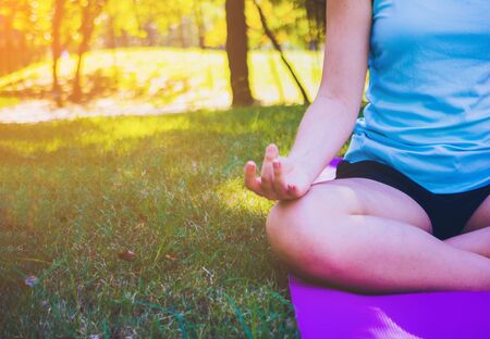 Body part group people have meditation for yoga.They are play yoga in park.good air,hobby, Zen, Photo concept freedom and good health.の写真素材
