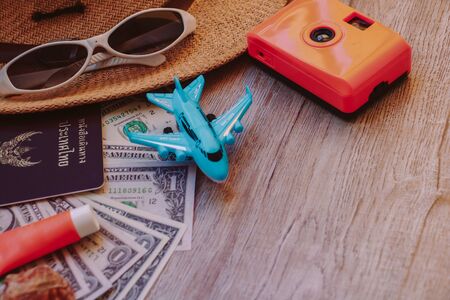 summer travel concept on wooden background