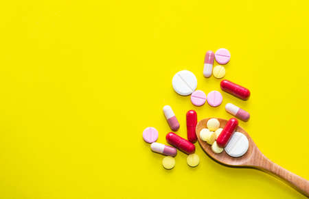 Close â up medicine on hand.A man holding  medicine.They are on pill background.Drug,remedy,hard drug,Photo Healthy lifestyle concept and good healthy.の写真素材