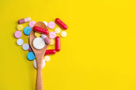 Close â up medicine on hand.A man holding  medicine.They are on pill background.Drug,remedy,hard drug,Photo Healthy lifestyle concept and good healthy.の写真素材