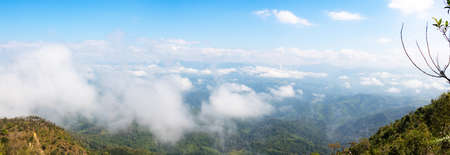 Blue sky and Yellow field with white clouds.landscape picture In Thailand.The Mountain...