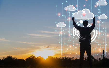 Hand man using laptop computer for doing cloud uploading data on the Internet online.network,media,keyword,Digital Web,Photo concept information and Technology.の写真素材