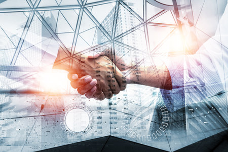 Double exposure picture. Picture mix  building city and businessman is Shake hands show Confident. Picture concept action man and business.の写真素材