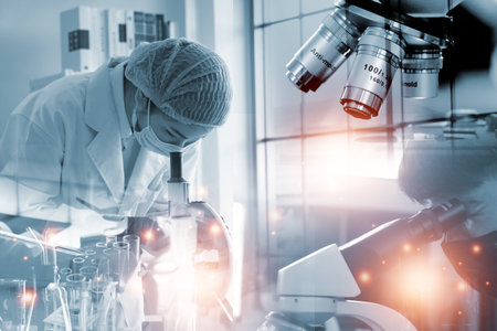 Double exposure microscope and Young woman scientific using equipment in the laboratory for research.Biotechnology,development,chemical,vaccine,COVID-19. Photo concept experimentation and research.の写真素材
