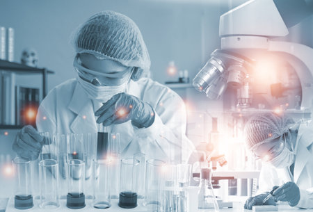 Double exposure microscope and Young woman scientific using equipment in the laboratory for research.Biotechnology,development,chemical,vaccine,COVID-19. Photo concept experimentation and research.の写真素材