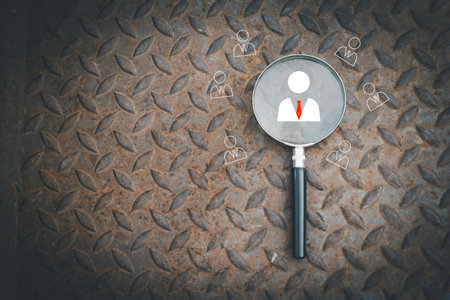 Goal board inside of magnifier glass for icon man on iron background.finding,selection situation,positive.Photo thinking and mindset concept.の写真素材