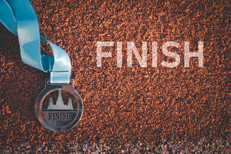 Achievement and Success Concept. Medal on the finish line.の写真素材
