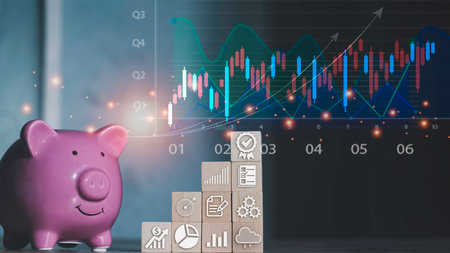 Saving  money.Pig piggy bank with light bulb.The icon finance on wood block. save money.investment,bank,finance,Photo financial saving and Saving.の写真素材