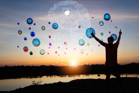Silhouette young man standing with circle network communication technology for global.Data in the global computer social.telecommunication,earth.photo modern technology and communication concept.の写真素材