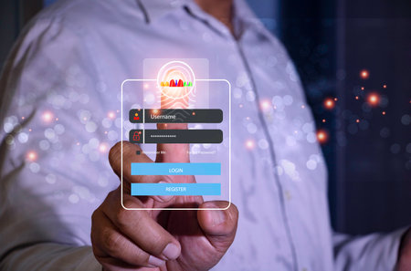 User typing login and password.Hand man use fingerprint  for  log in to enter login and password.sign in page,User profile,Information privacy,Internet.photo Cyber protection and technology concept.の写真素材