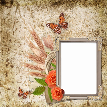 Vintage frame on grunge background with  flowers  and butterflyの写真素材