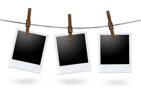 blank photo frames on a clothesline 