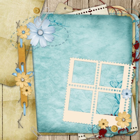 Old shabby style  photoalbum page with flowersの写真素材