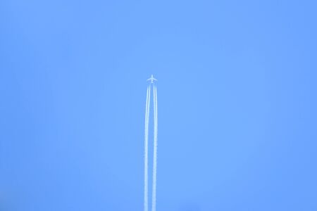 Airplane In The Blue Sky ,Contrails