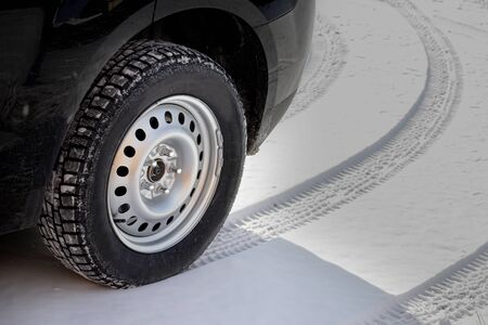 Winter tires on a snowing day