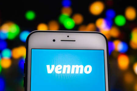 Calgary, Alberta, Canada. May 21, 2020. A white iPhone Plus with the Venmo logo on the screenのeditorial素材