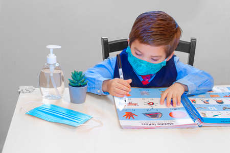 Calgary, Alberta, Canada. Sep 6, 2020. A kinder garden, pre-school student learning with an activity...