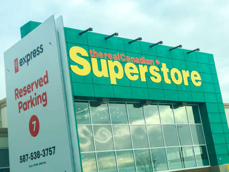 Calgary Alberta, Canada. Oct 17, 2020. The real canadian superstore building with the PC express reserved Parking for picking up groceries.のeditorial素材