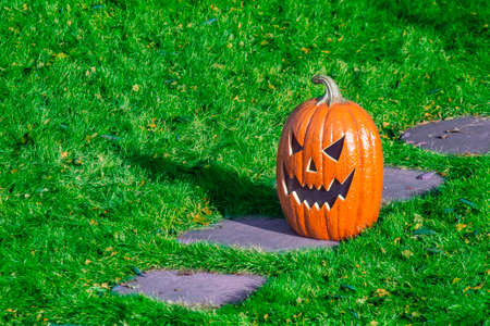Jack o'lantern outside carved pumpkin, turnip, or other root vegetable lantern associated with Halloween.の写真素材