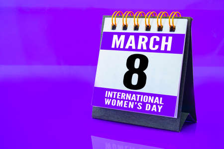 A calendar with March 8 St. International Women's Day date on a purple backgroundの写真素材