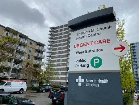 Calgary, Alberta, Canada. May 25, 2021. Sheldon M. Chumir Health Centre Urgent Care Alberta Health Services Parking lot sign.のeditorial素材