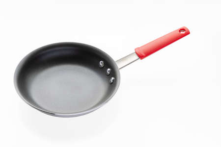 Front view of a commercial grade nonstick fry pan, heavy gauge aluminum. PFOA-Free reinforced nonstick-coating.の写真素材