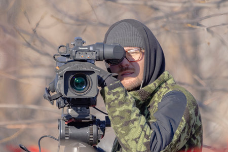 Nov 11, 2022. Calgary, Alberta, Canada. Front view of a Panasonic P2HD camera man filming out in the...
