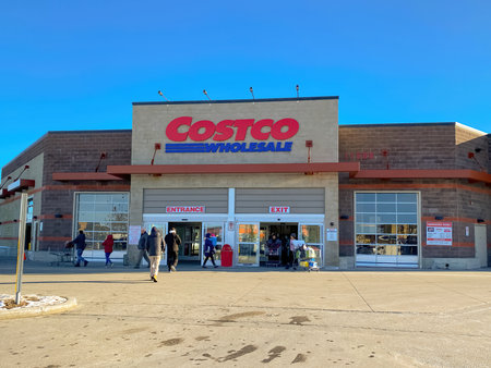 Nov 15, 2022. Calgary, Alberta, Canada. Main entrance of a Costco wholesale store during the day with blue sky.のeditorial素材