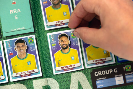 Dec 8, 2022. Calgary, Alberta, Canada. A football soccer ball fan adding a Brazilian Panini sticker...