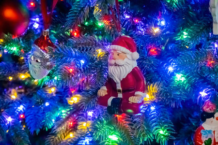 Calgary, Alberta, Canada. Dec 27, 2022. A Santa Claus ornament on a Christmas tree. Concept: Christmas season.のeditorial素材