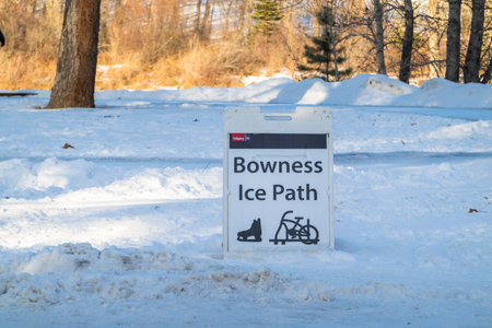 Calgary, Alberta, Canada. Dec 31, 2022. A Bowness Ice Path sign at a Bowness Park during the winter.のeditorial素材