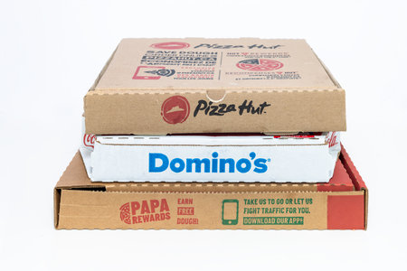 Calgary, Alberta, Canada. Jan 11, 2023. Front to Pizza boxes. Pizza hut, Domino's, Papa John's.