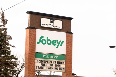 Calgary, Alberta, Canada. Feb 13, 2023. A Sobeys sign outside of a store. The second largest supermarket chain in Canada.のeditorial素材