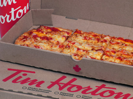 Calgary, Alberta, Canada. Feb 22, 2023. A close up to an open Tim Hortons Flatbread Cheese Pizza...
