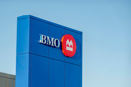 Calgary, Alberta, Canada. Mar 17, 2023. A BMO Bank of Montreal sing on a branch building.のeditorial素材